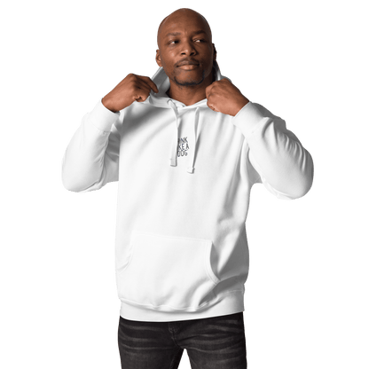 A man stands against a plain white background, wearing the Think Like a Dog Hoodie — Everyday Comfort by THiNK LiKE A DOG®, a cozy unisex hoodie featuring a small printed logo on the chest.