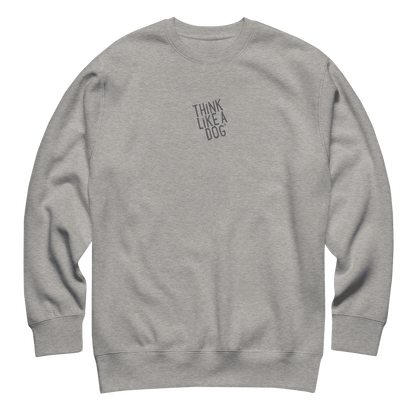 The THiNK LiKE A DOG® Think Like a Dog Sweatshirt — Everyday Comfort is a cozy unisex cotton fleece crewneck with "THINK LIKE A DOG" in small, uppercase letters on the left chest.