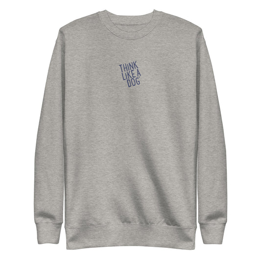 The THiNK LiKE A DOG® sweatshirt, featuring a cozy, minimalist design with "THINK LIKE A DOG" in blue on the front, is perfect for dog lovers seeking inspirational clothing.