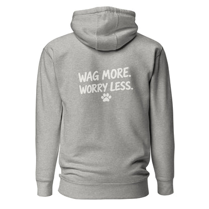 Carbon Grey Wag More. Worry Less. hoodie, back view — white slogan and paw print on heather-grey fleece.