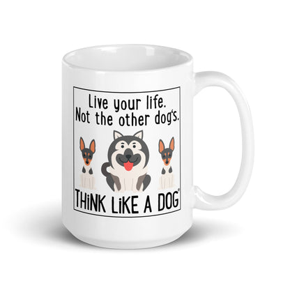 THiNK LiKE A DOG® white glossy mug with a graphic of three cartoon dogs and the text "Live your life. Not the other dog's. Think like a dog.