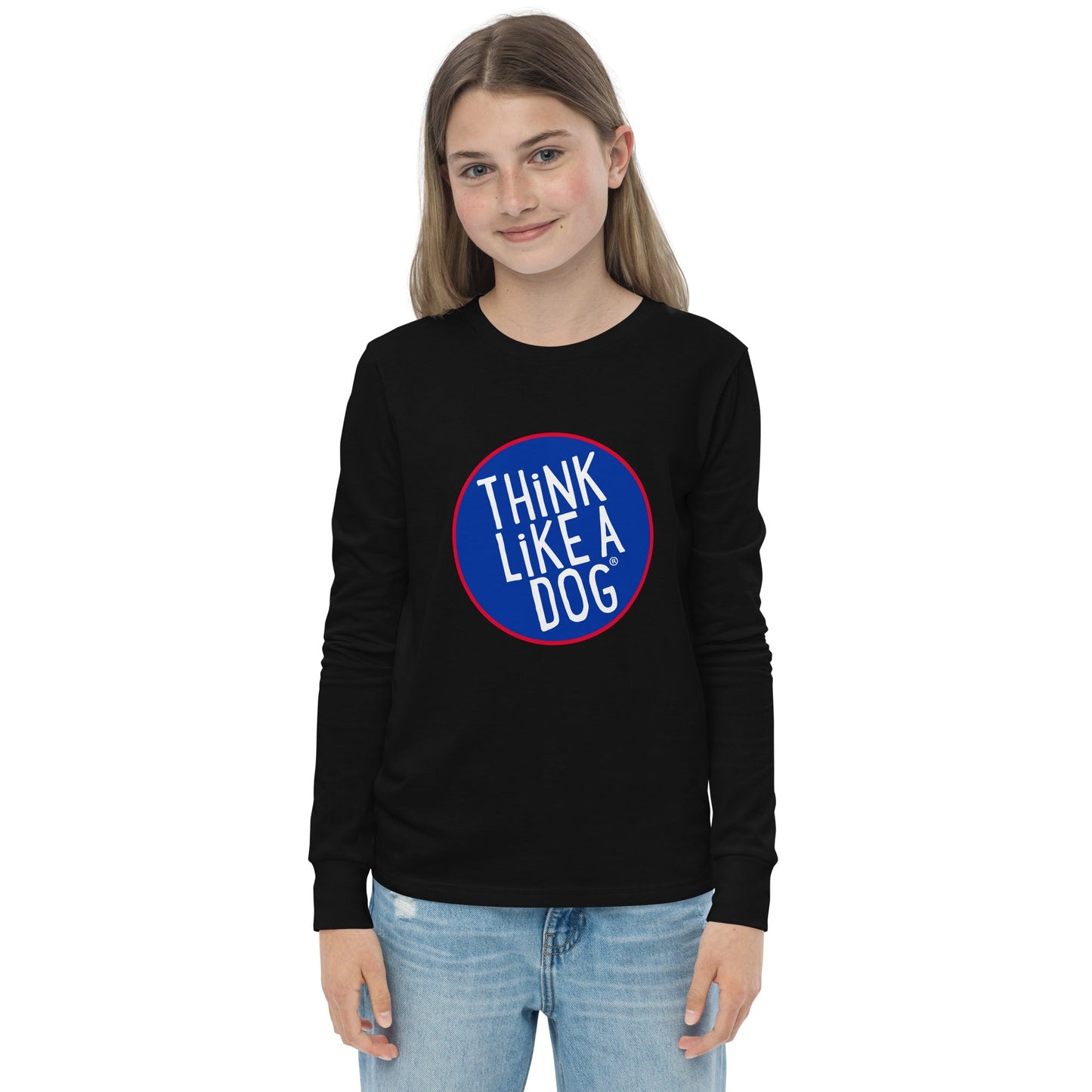 A person wearing the THiNK LiKE A DOG® Kids' Think Like A Dog NASA-Style Long Sleeve Tee, crafted from high-quality soft fabric and featuring the text "THINK LIKE A DOG" inside a blue circle outlined in red. This cute and quirky dog lover tee is perfect for anyone who adores our canine friends.