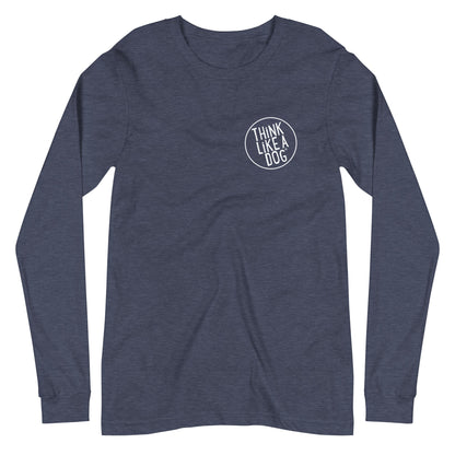 The THiNK LiKE A DOG® Unisex Long Sleeve Tee in navy blue showcases a small white "Think Like A Dog" logo on the left chest area, making it the perfect comfortable dog-themed apparel for dog lovers.