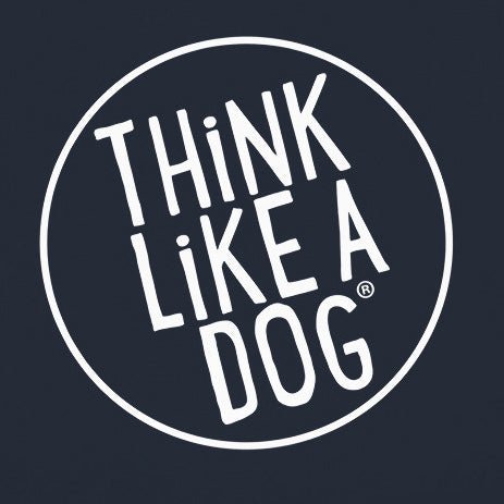 Logo with the phrase "think like a dog" encircled on a THiNK LiKE A DOG® Unisex Premium Hoodie With White Logo against a dark background.